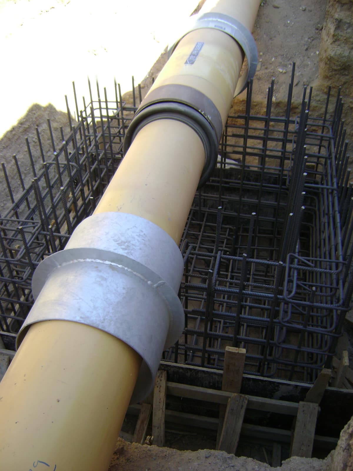A cased pipe crossing with metallic casing spacers before encasement at Hurghada