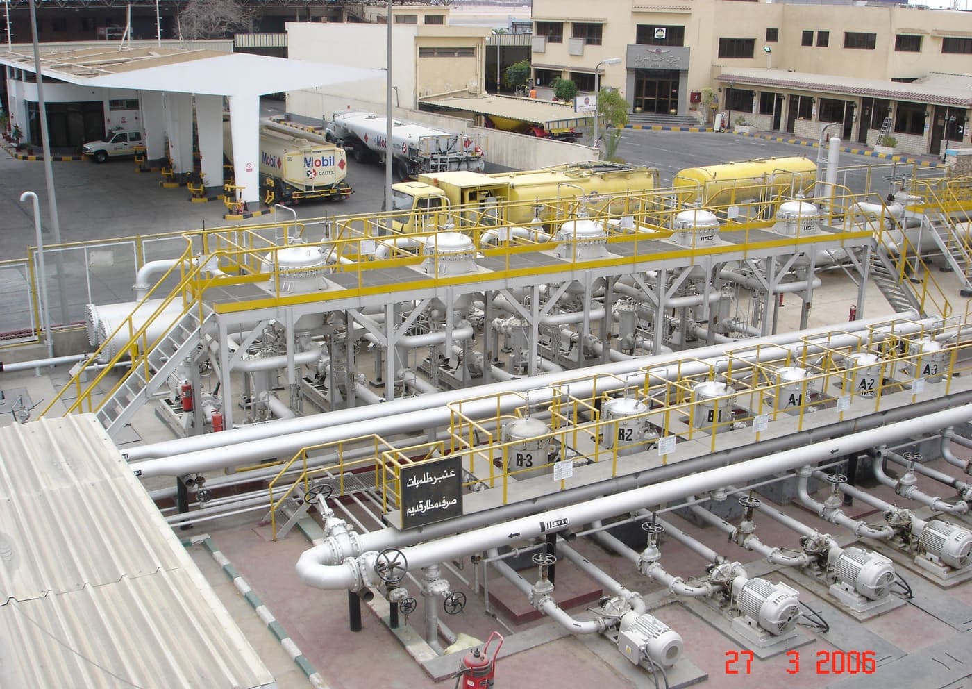 Skid-mounted filtration, pumping and metering array with refuellers behind at the Taba depot